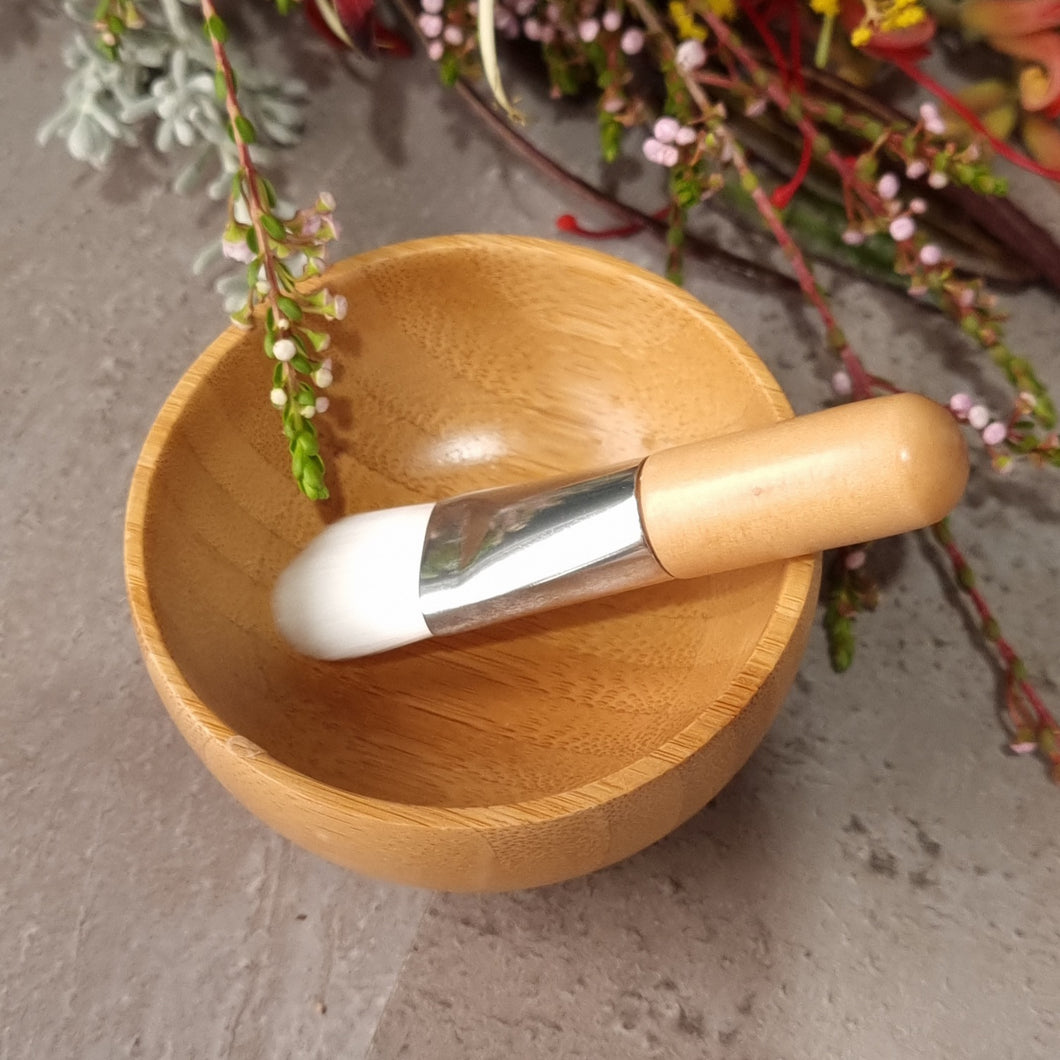 Mini bamboo mixing pot and brush.